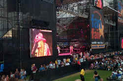Jamie O'Neal on the Jumbotron on stage 