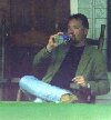John Berry relaxes at his booth at Fan Fair